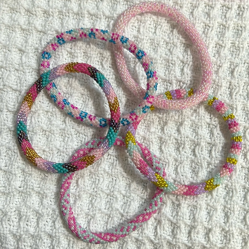 5 Sashka Co beaded bracelets. Pink Blue Gold. Approx 8”.